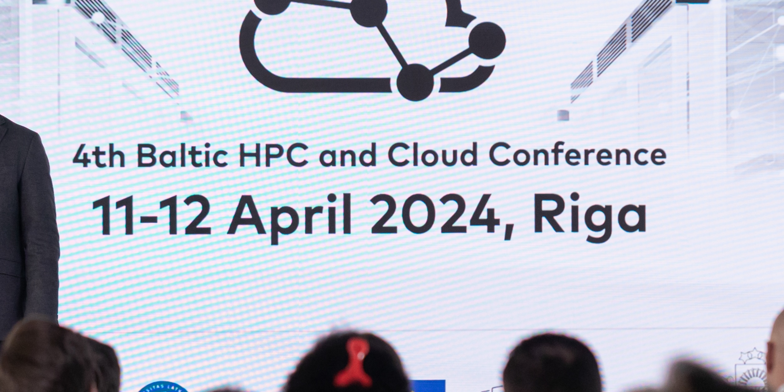 A screen showing the title of the conference. 4th Baltic HPC and Cloud Conference